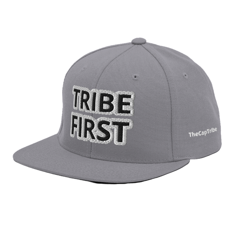 Front view of Tribe First snapback cap by TheCapTribe™, premium black streetwear hat with bold white embroidery