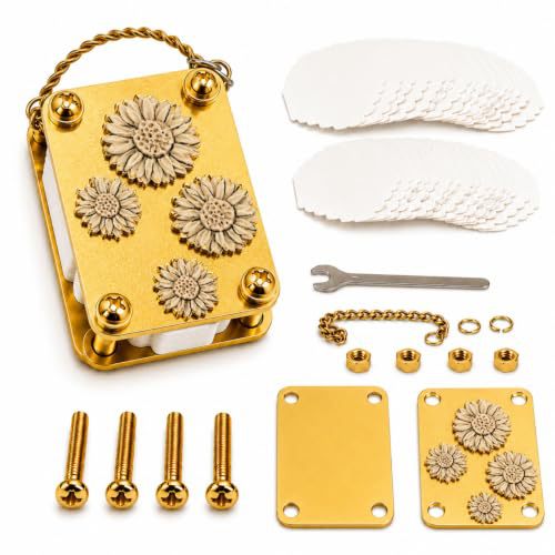 Gold-colored metal flower press with floral design, pressing papers, wrench and assembly hardware.