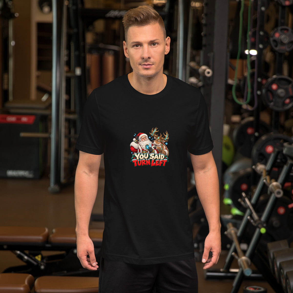 Front view of the black Bella + Canvas 3001 T-shirt featuring the “You Said Turn Left” Santa and reindeer design.