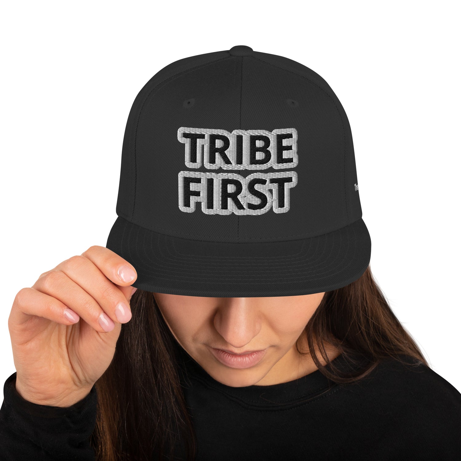 Front view of Tribe First snapback cap by TheCapTribe™, premium black streetwear hat with bold white embroidery