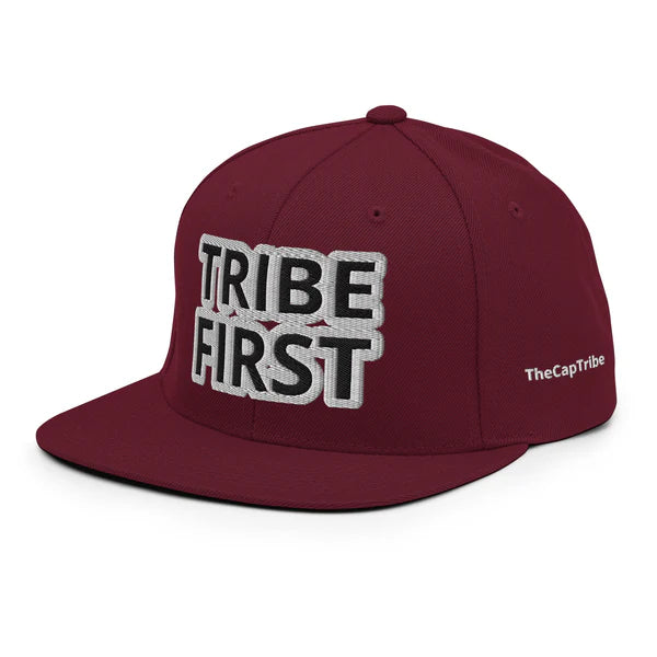 Front view of Tribe First snapback cap by TheCapTribe™, premium black streetwear hat with bold white embroidery
