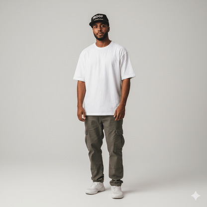 Studio lifestyle photo of a man wearing Proof Over Hype snapback hat – premium streetwear by TheCapTribe™