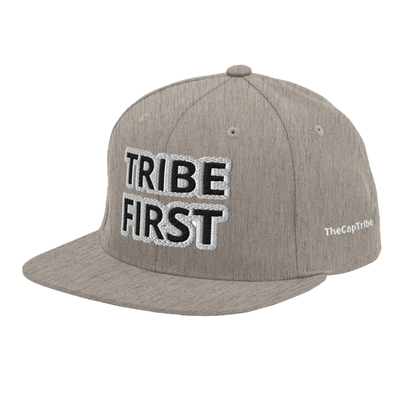 Front view of Tribe First snapback cap by TheCapTribe™, premium black streetwear hat with bold white embroidery.
