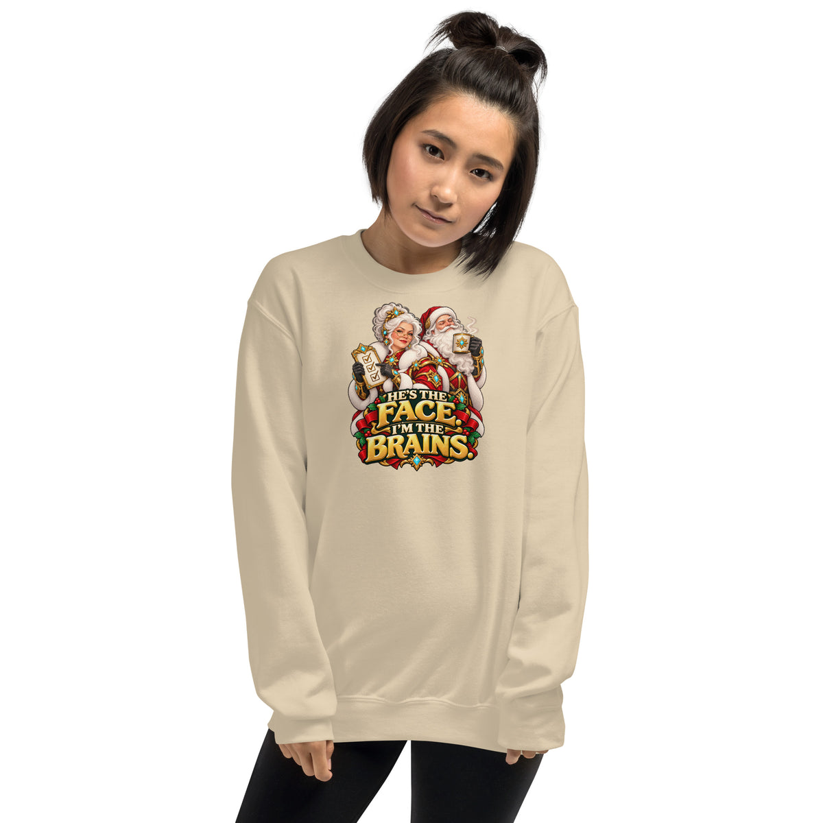 Woman wearing a Sand Gildan 18000 crewneck with Mrs. Claus, Santa and HE&
