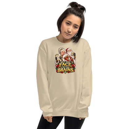 Woman wearing a Sand Gildan 18000 crewneck with Mrs. Claus, Santa and HE&