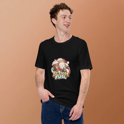 Lifestyle mockup of a model wearing the black Bella+Canvas 3001 tee with the SLEIGH FUEL Santa coffee artwork on the front, against a warm tan background.