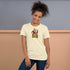 Official mockup of a woman wearing the Natural Bella + Canvas 3001 Christmas tee with Mrs. Claus and I RUN THIS POLE printed on the front.